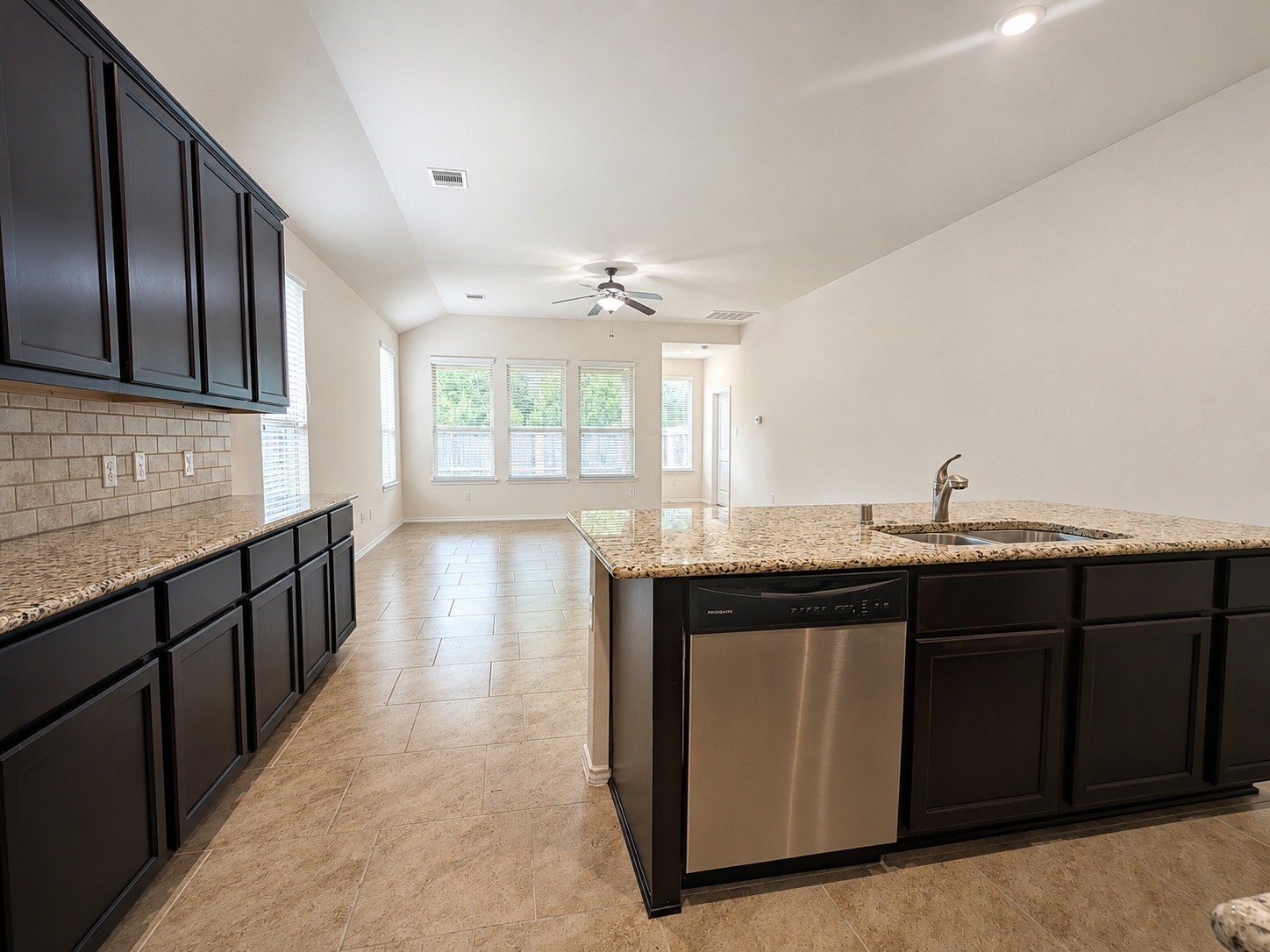 24315 Ravenna Landing Loop Spring, TX 77389 - Photo 11 of 37 a kitchen with stainless steel appliances granite countertop a sink stove and cabinets