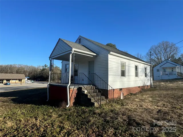 a house view with a garden space