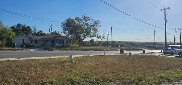 a view of a house with outdoor space and sitting area
