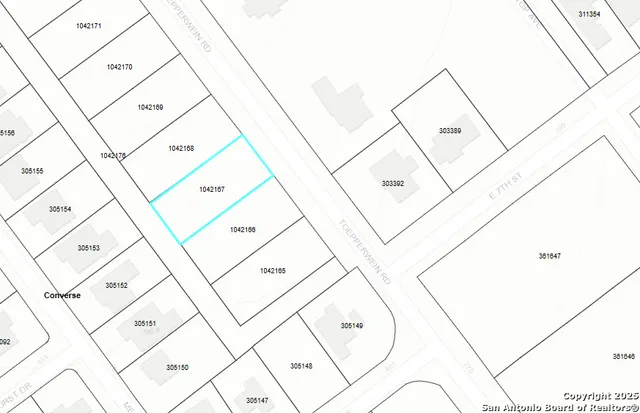 a dirty bathroom with white tiles