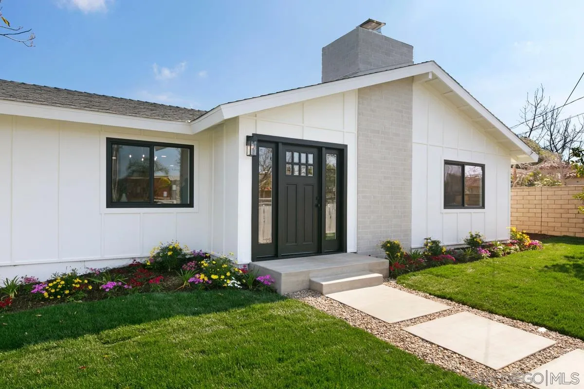 853 Regal Road Encinitas, CA 92024 - Photo 3 of 34 a front view of a house with a yard