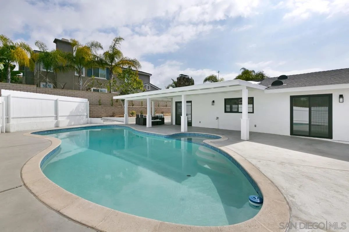 853 Regal Road Encinitas, CA 92024 - Photo 33 of 34 a view of a house with swimming pool