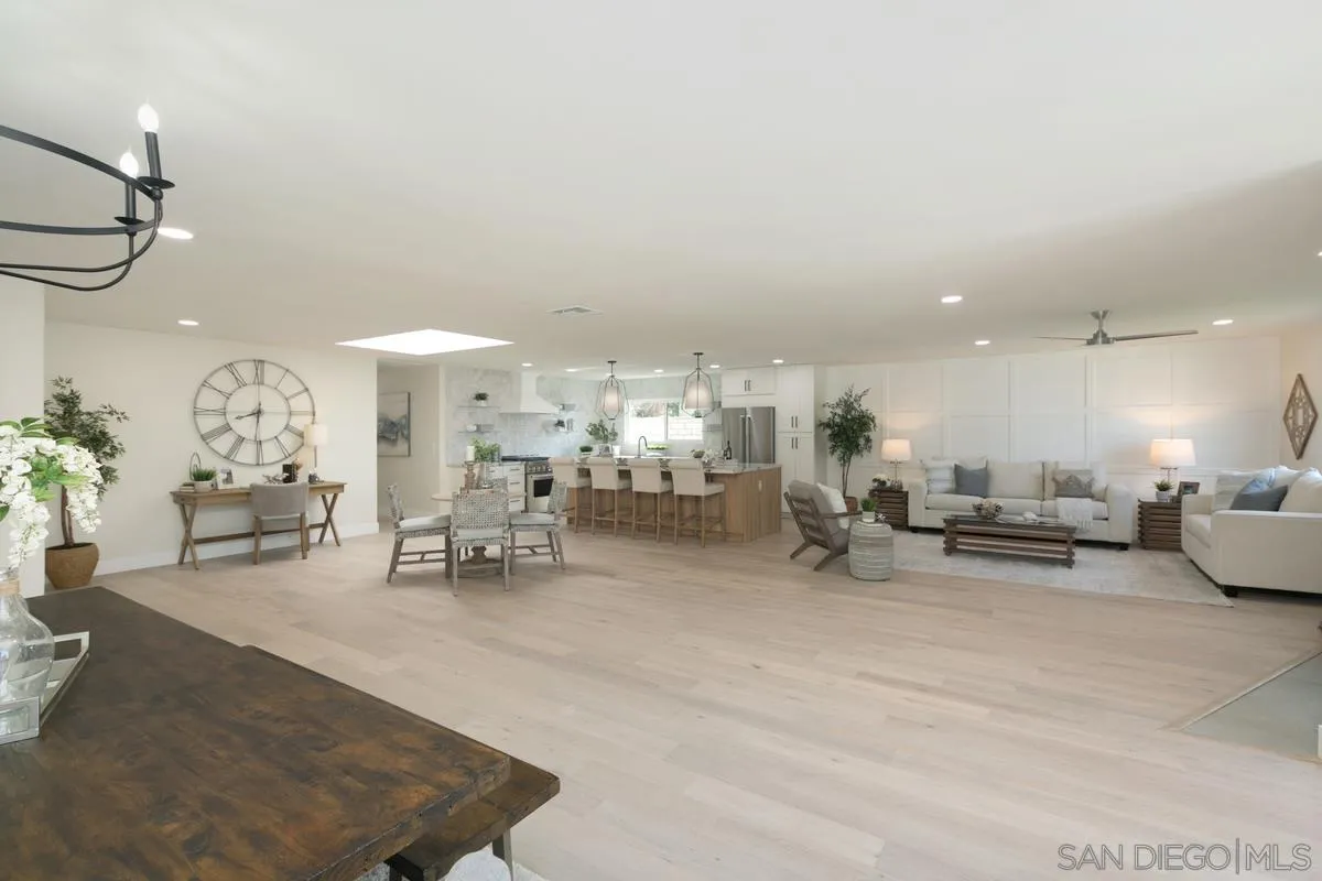 853 Regal Road Encinitas, CA 92024 - Photo 8 of 34 a living room with furniture and a table