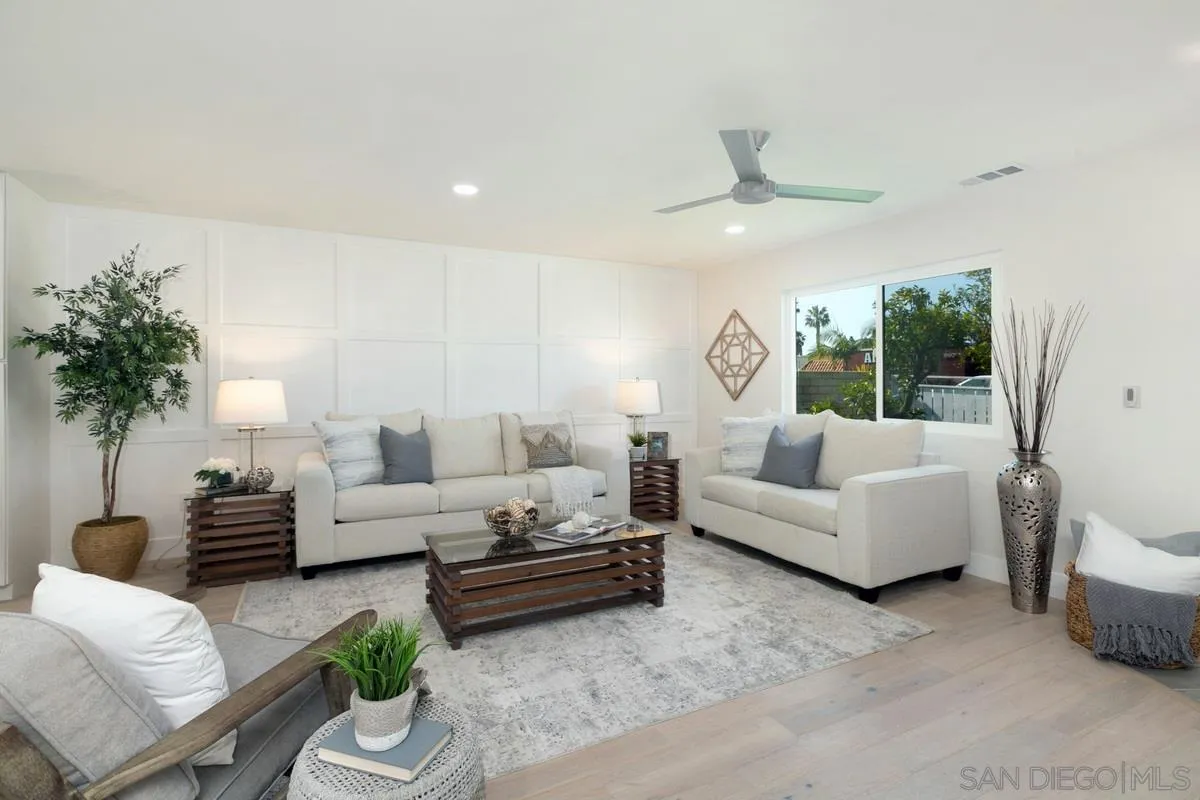 853 Regal Road Encinitas, CA 92024 - Photo 10 of 34 a living room with furniture and a large window