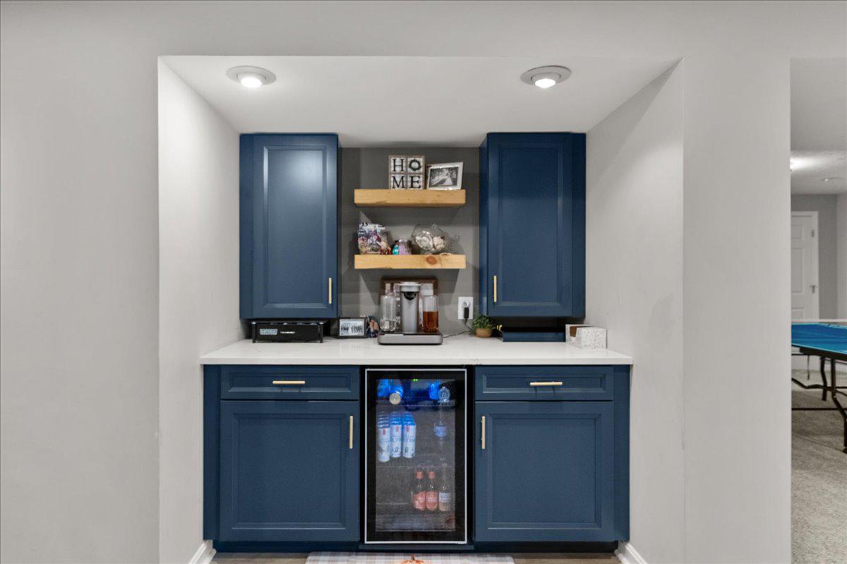 308 Huntersridge Road Winchester, VA 22602 - Photo 52 of 65 Custom blue cabinetry with modern flair.