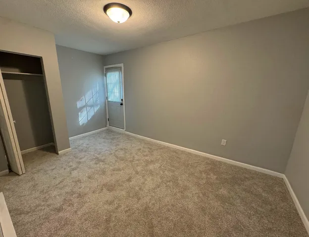 an empty room with closet