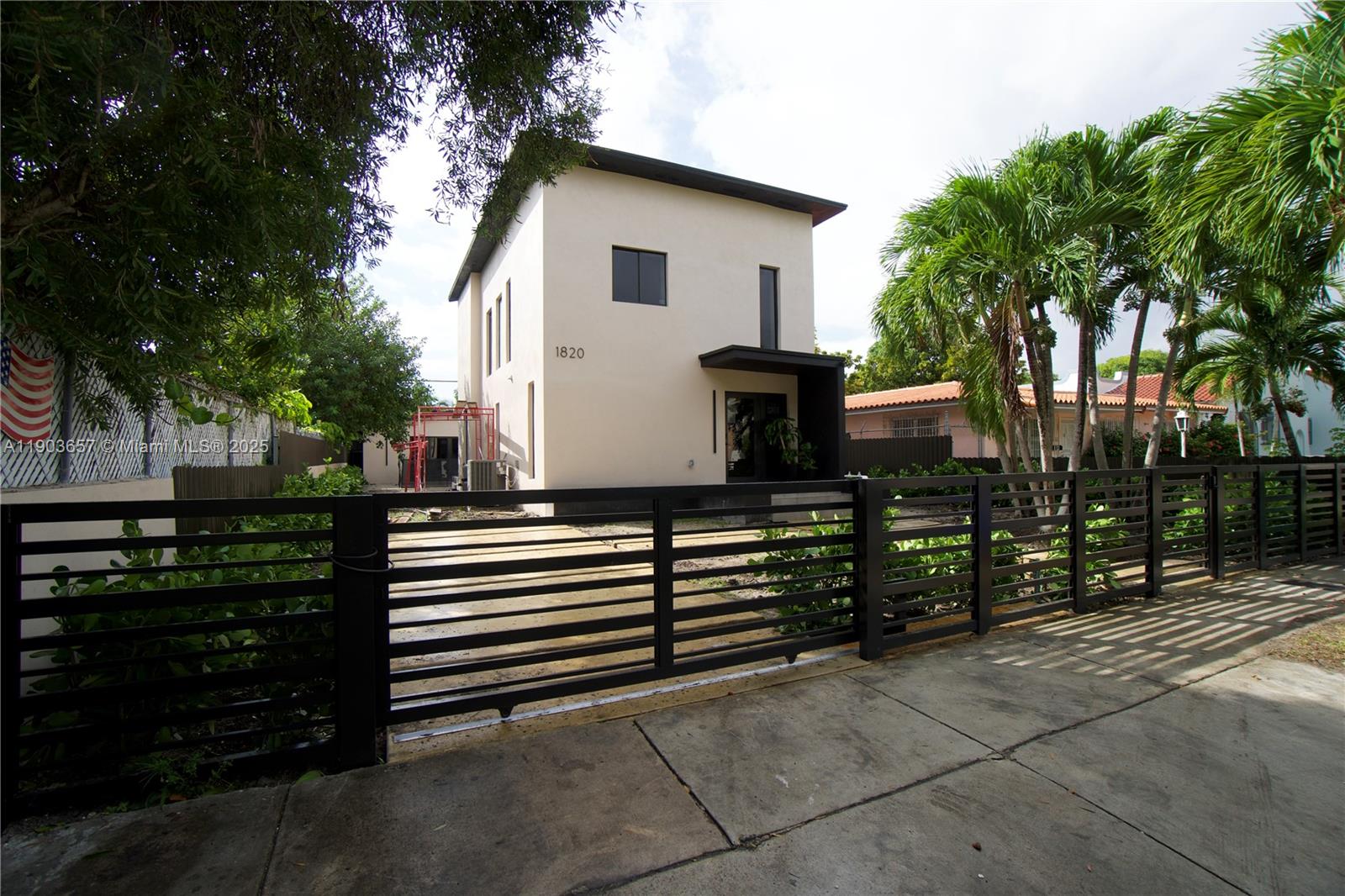 1820 Southwest 10th Street Miami, FL 33135 - Photo 2 of 13 a view of a house with backyard and sitting area