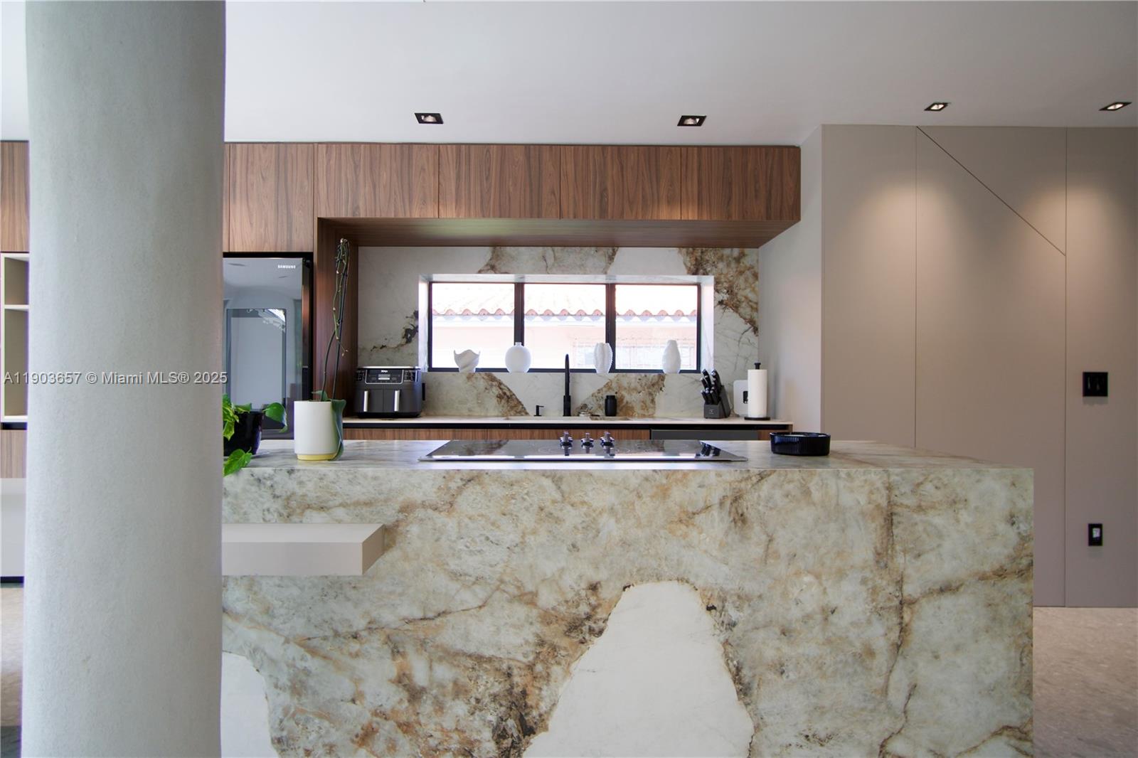 1820 Southwest 10th Street Miami, FL 33135 - Photo 5 of 13 a view of a kitchen with a sink and cabinets