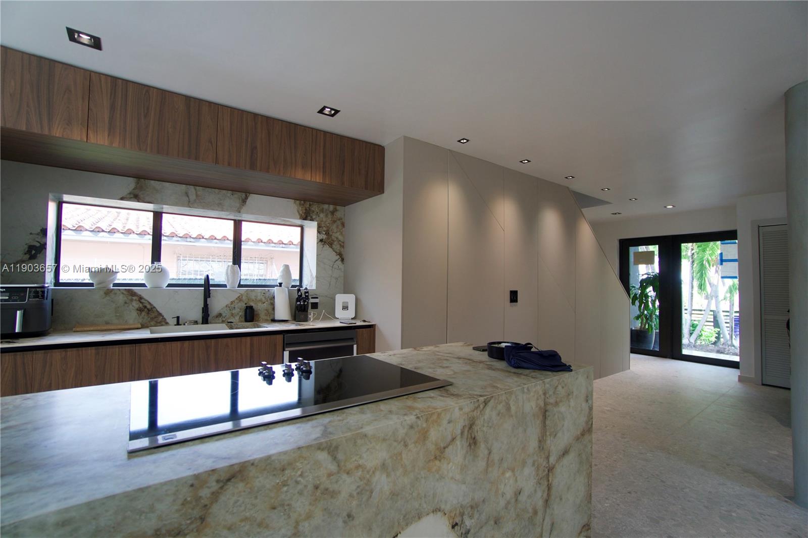 1820 Southwest 10th Street Miami, FL 33135 - Photo 6 of 13 a room with gym equipment and large window