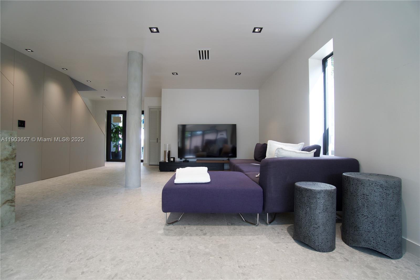 1820 Southwest 10th Street Miami, FL 33135 - Photo 10 of 13 a living room with furniture and a fireplace