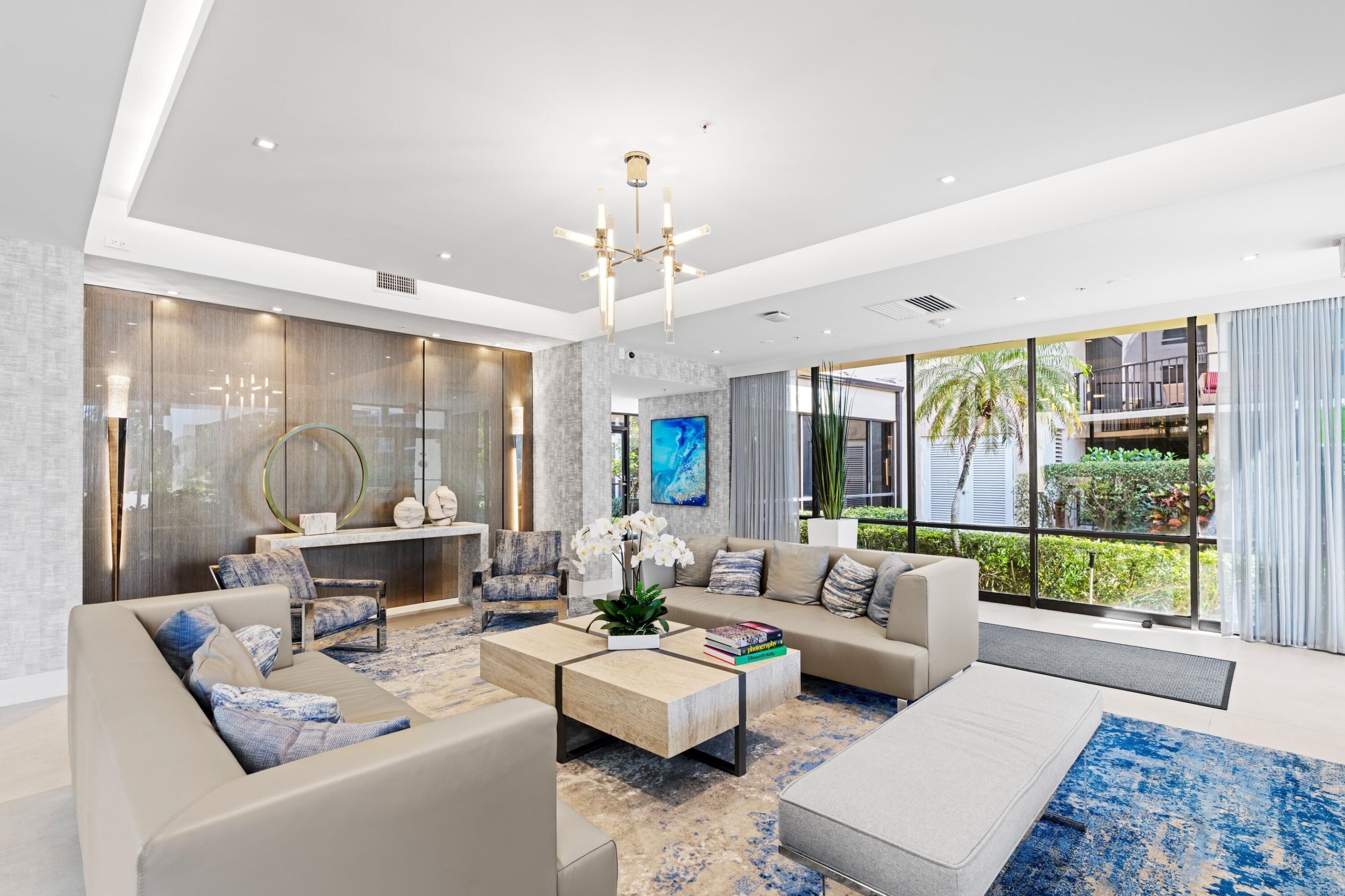 899 Jeffery Street, Unit 112 Boca Raton, FL 33487 - Photo 25 of 33 a living room with furniture and a large window