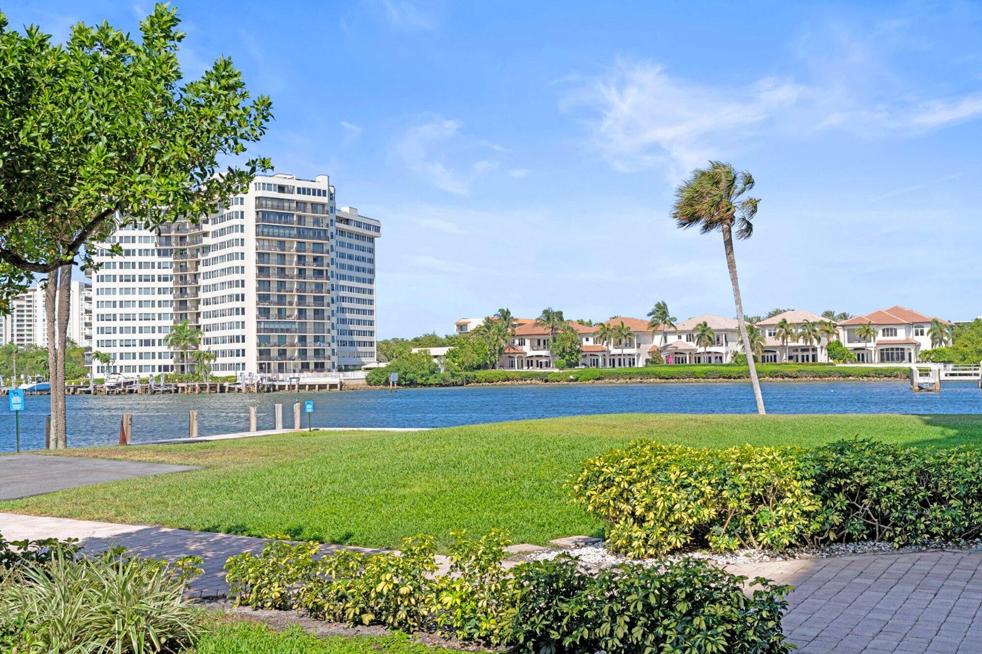 899 Jeffery Street, Unit 112 Boca Raton, FL 33487 - Photo 10 of 33 a view of building with garden and statue in the background