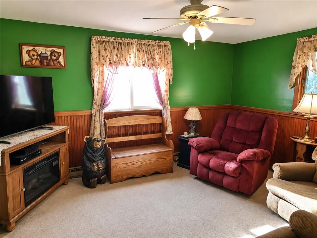 741 Center Avenue Butler, PA 16001 - Photo 9 of 27 a living room with furniture and a flat screen tv