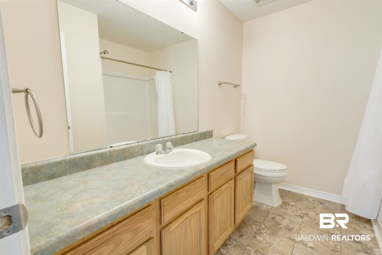 26361 Cabinet Shop Road Loxley, AL 36551 - Photo 17 of 24 Guest Bathroom