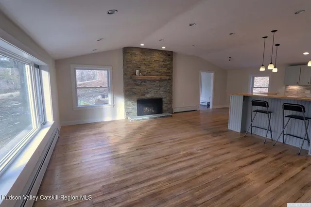 a view of a kitchen and dining room