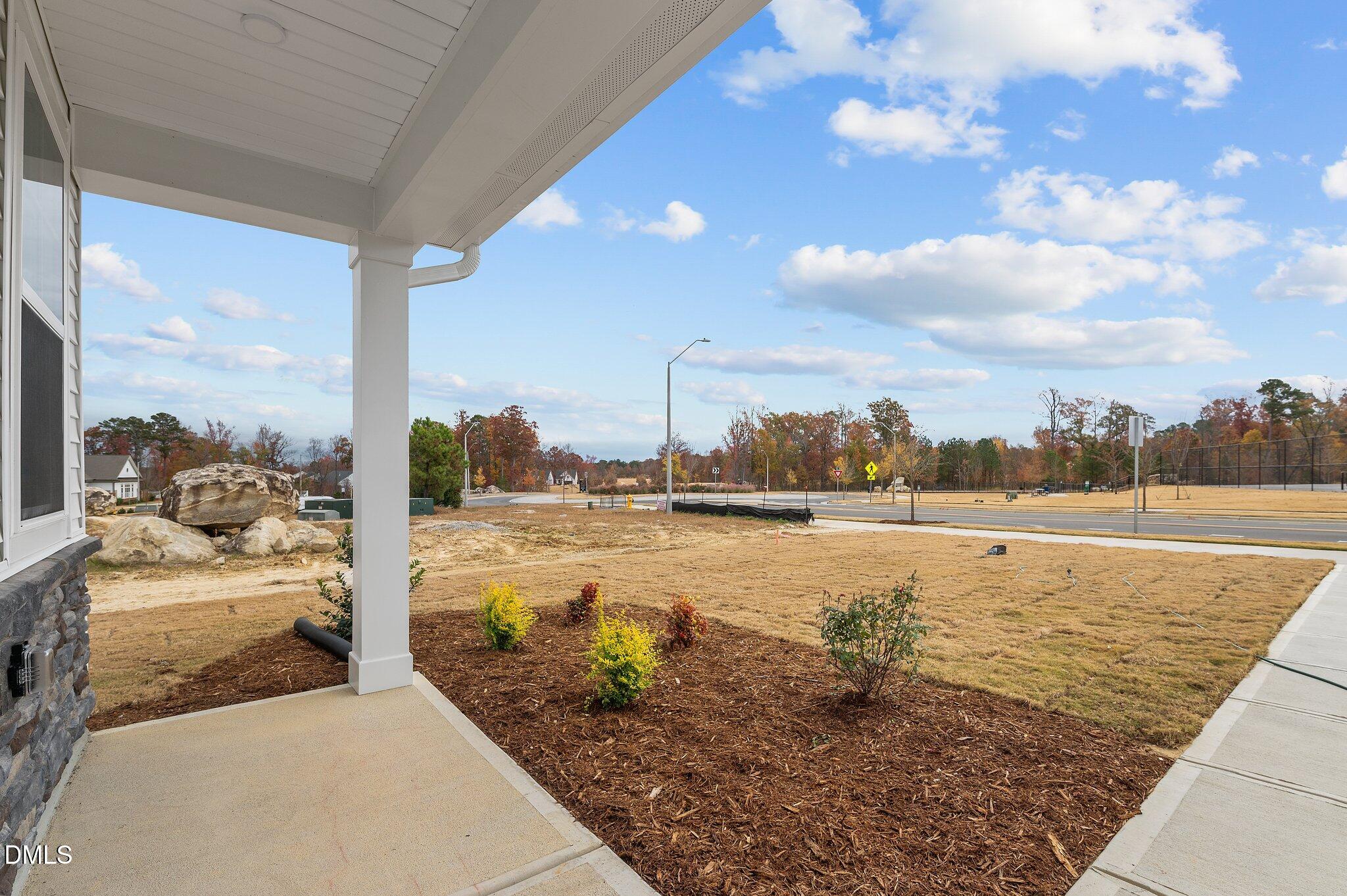 2202 Kasota Lane Raleigh, NC 27610 - Photo 11 of 79 a view of a lake with a mountain