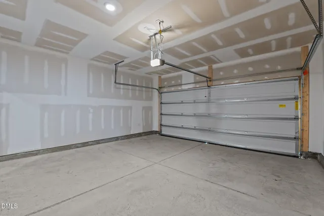 a view of an entryway with wooden floor and stairs