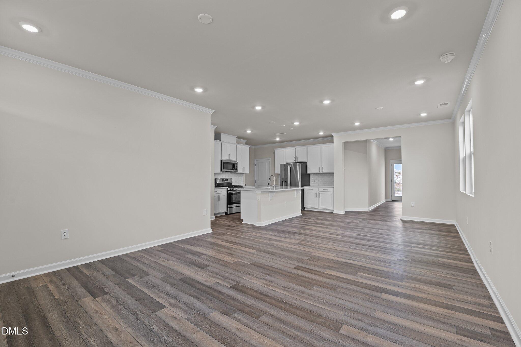 2202 Kasota Lane Raleigh, NC 27610 - Photo 21 of 79 a view of kitchen with wooden floor