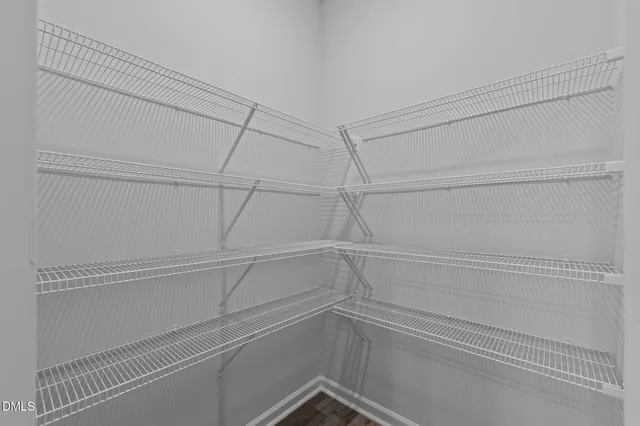 a view of a room with racks on the wall