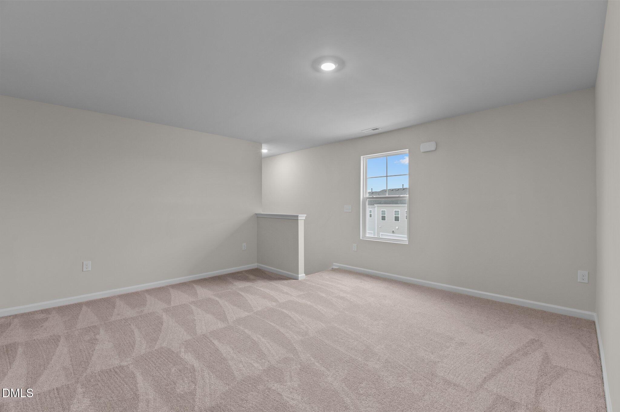 2202 Kasota Lane Raleigh, NC 27610 - Photo 34 of 79 a view of an empty room with a window