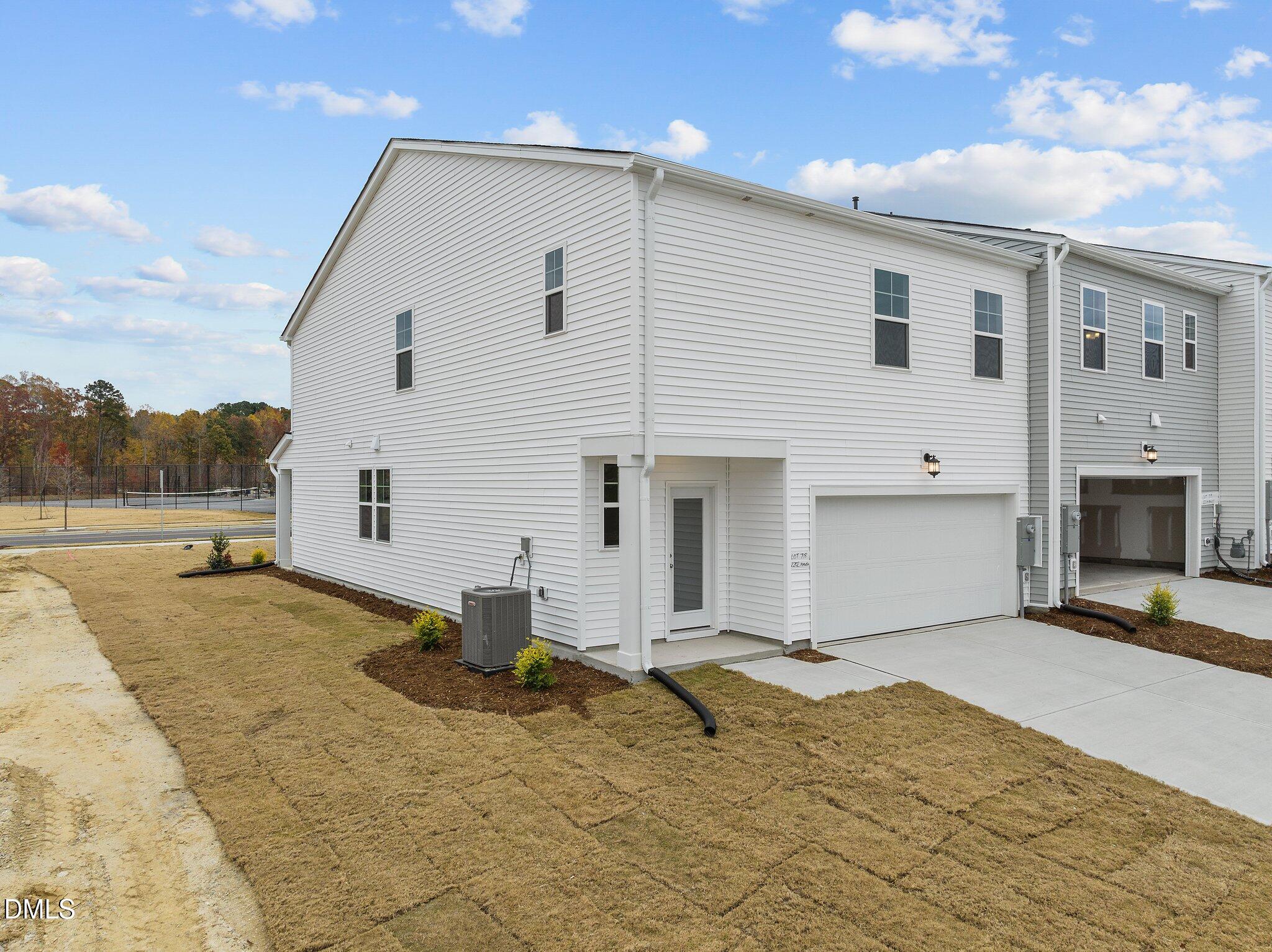 2202 Kasota Lane Raleigh, NC 27610 - Photo 4 of 79 a view of a house with a patio