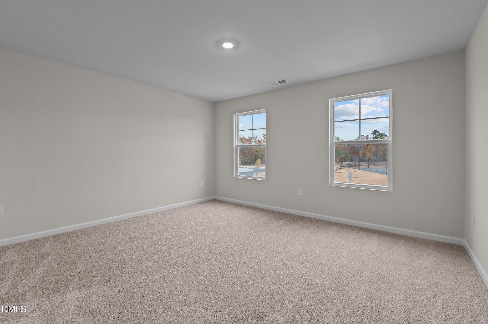 2202 Kasota Lane Raleigh, NC 27610 - Photo 41 of 79 a view of an empty room with a window