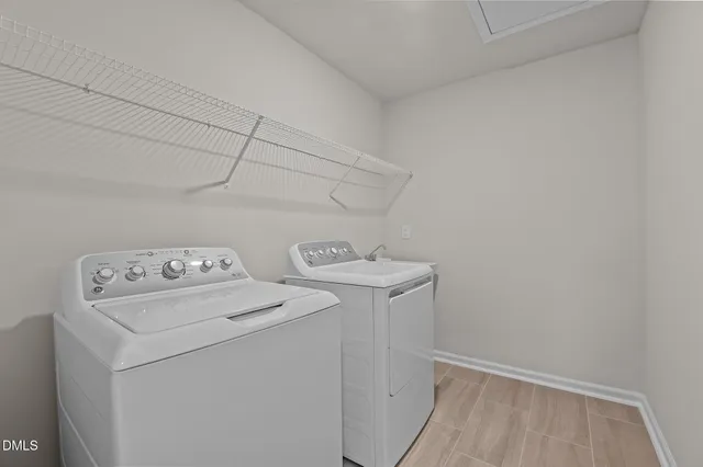 a view of a kitchen with kitchen island