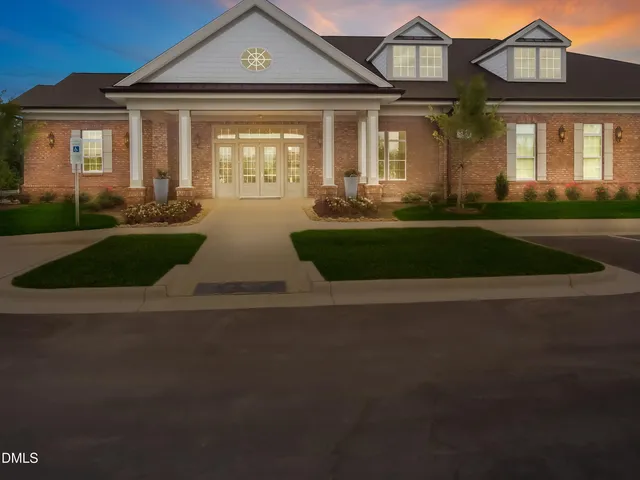 a view of a kitchen with a large window