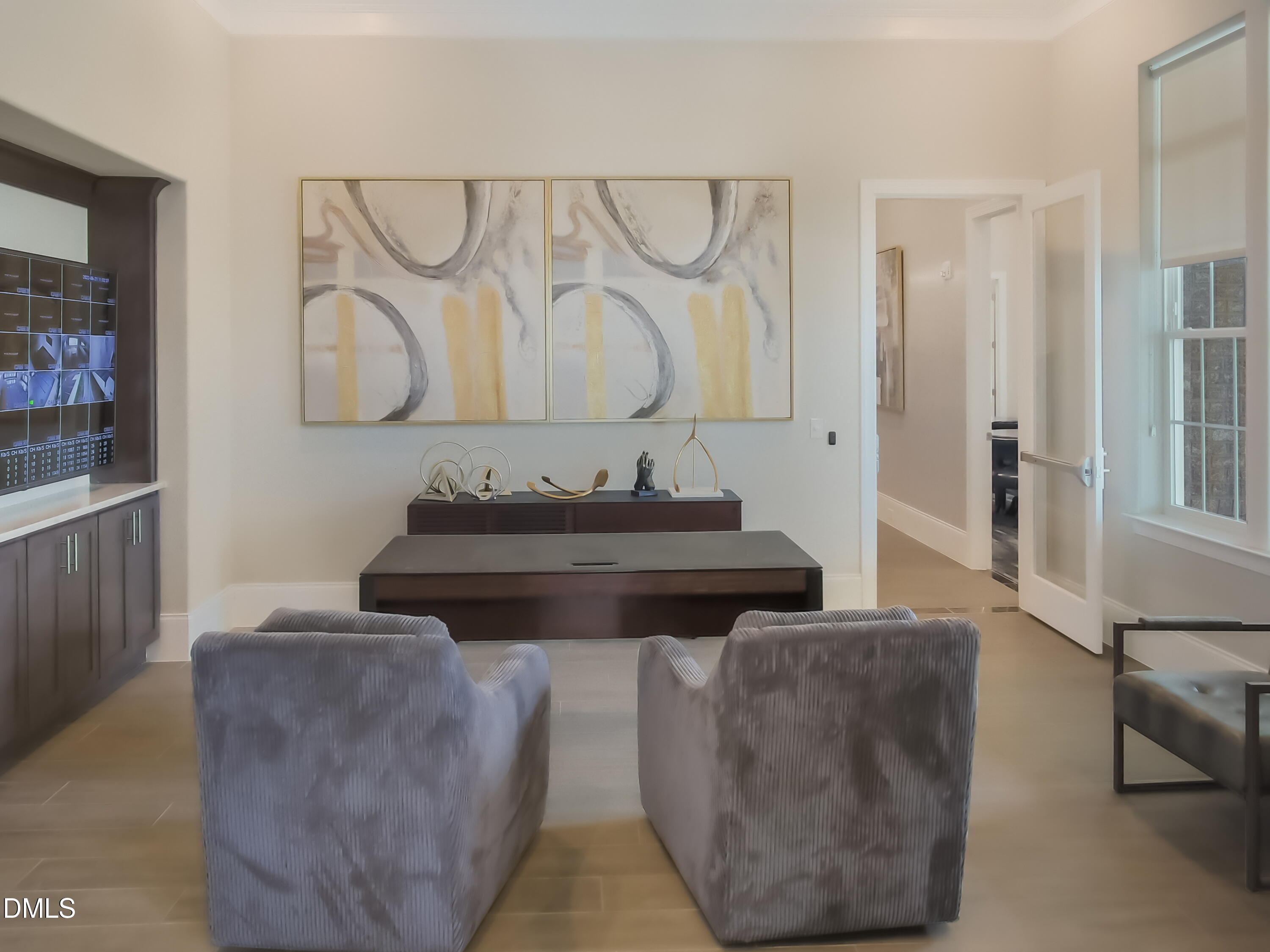 2202 Kasota Lane Raleigh, NC 27610 - Photo 50 of 79 a living room with furniture and a wooden floor