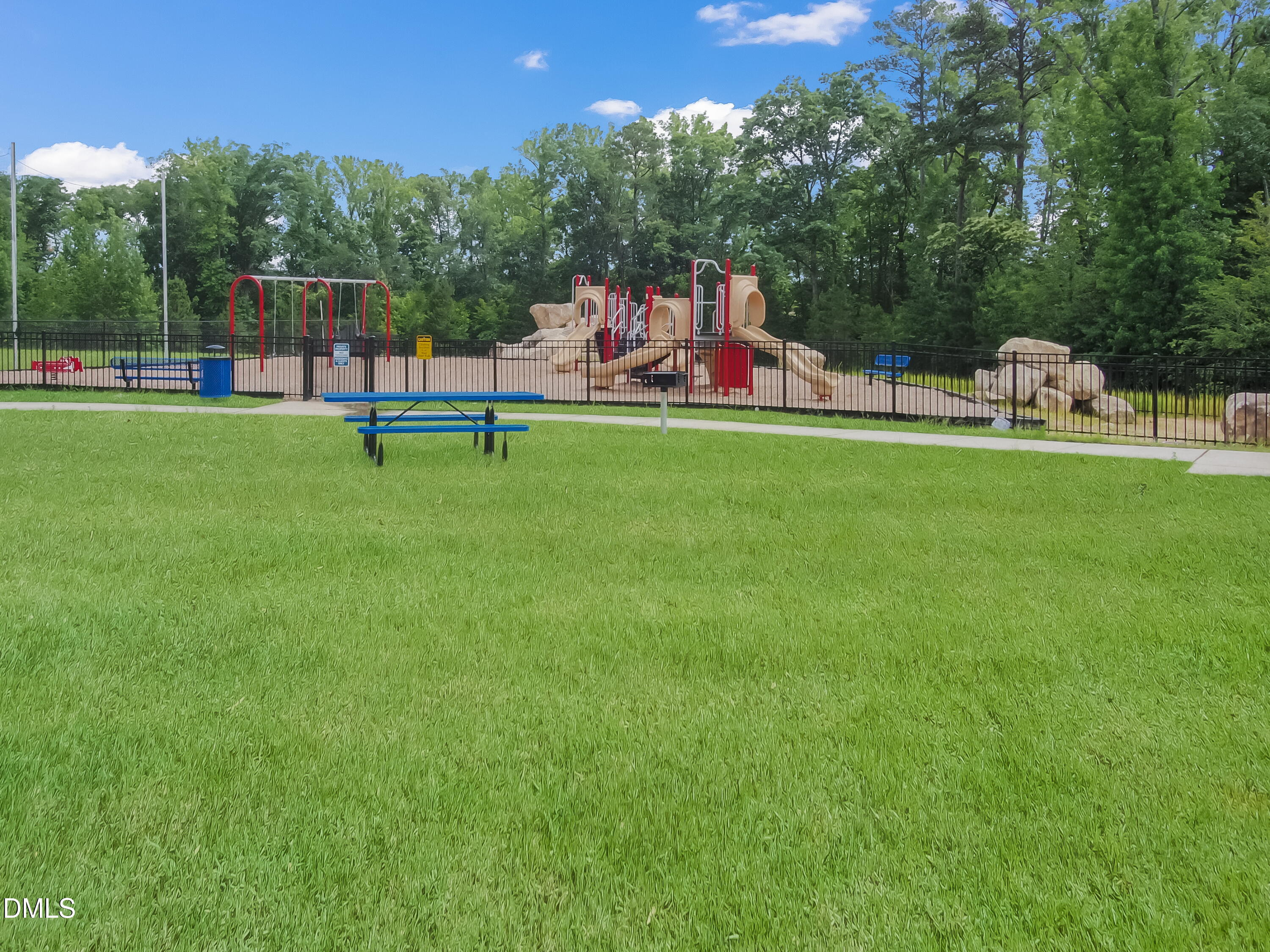2202 Kasota Lane Raleigh, NC 27610 - Photo 67 of 79 a view of a park with swings