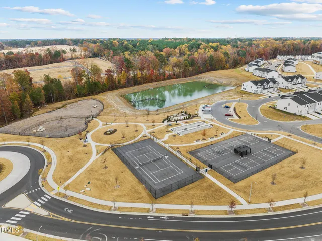 a view of a swimming pool with an outdoor seating