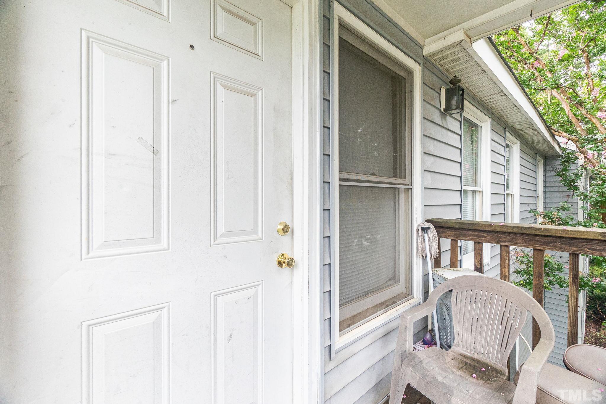 133 Bashford Road Raleigh, NC 27606 - Photo 24 of 45 a living room with furniture and a window