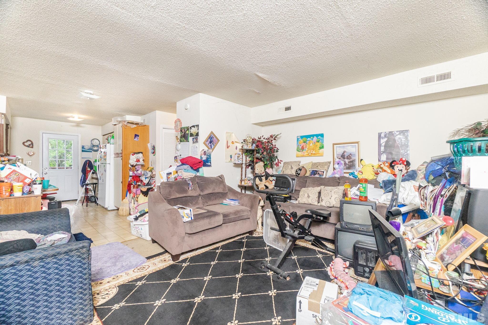 133 Bashford Road Raleigh, NC 27606 - Photo 26 of 45 a very nice looking room with many windows and plants