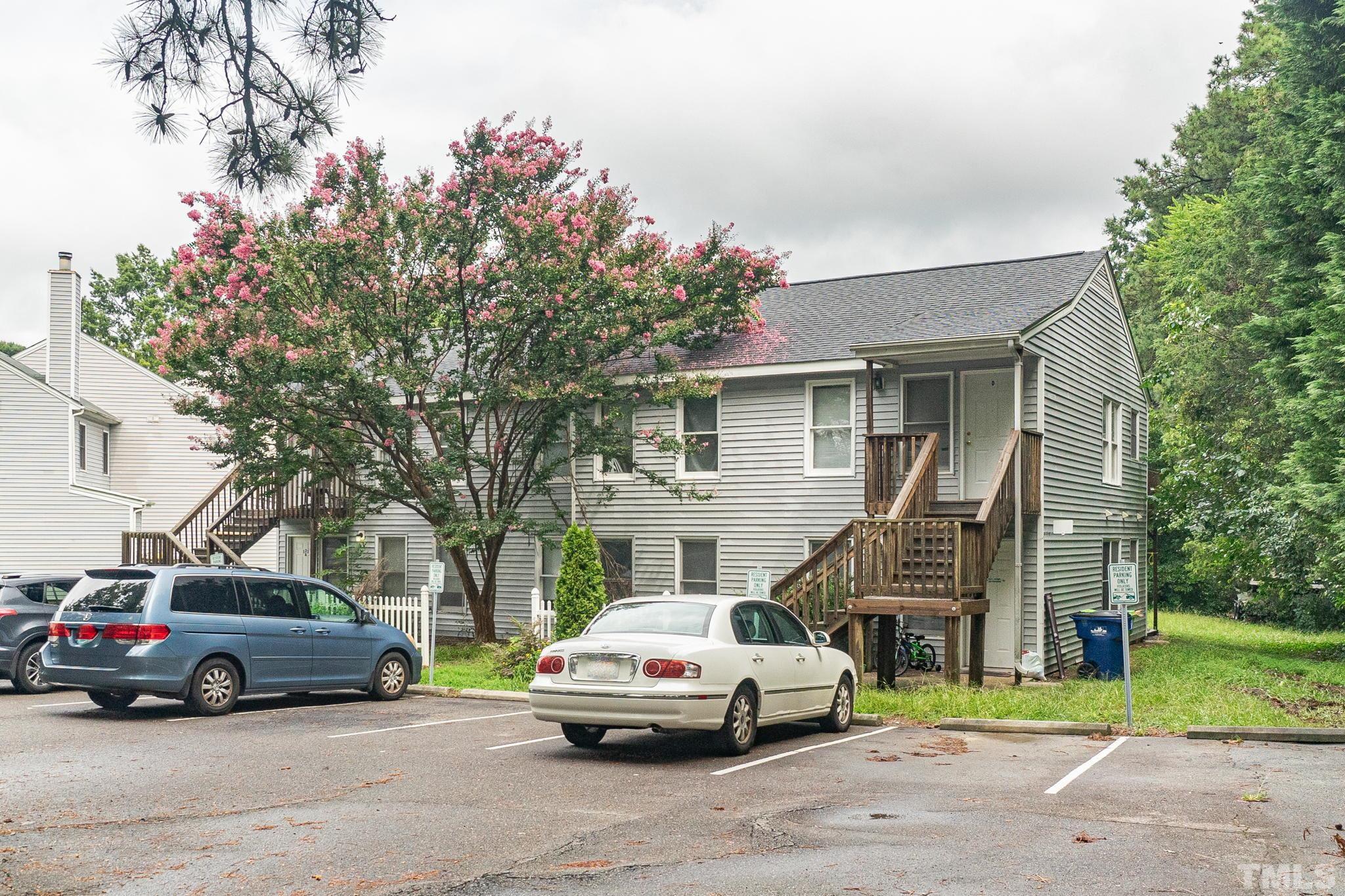 133 Bashford Road Raleigh, NC 27606 - Photo 5 of 45 a car parked in front of a house