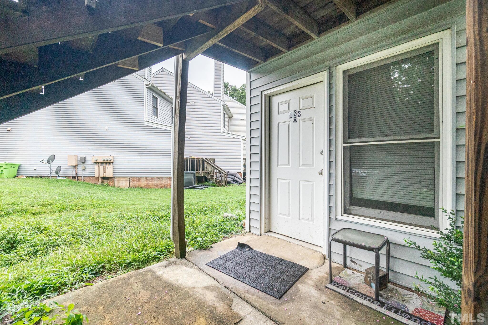 133 Bashford Road Raleigh, NC 27606 - Photo 6 of 45 a view of backyard with tub and garden