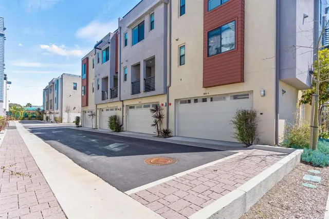 a view of a street with buildings