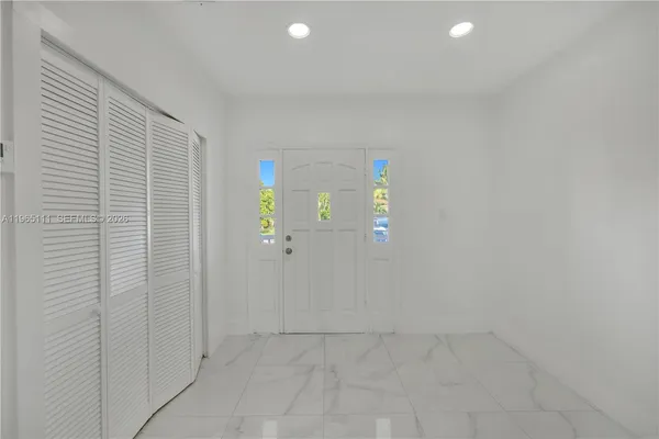 an empty room with windows