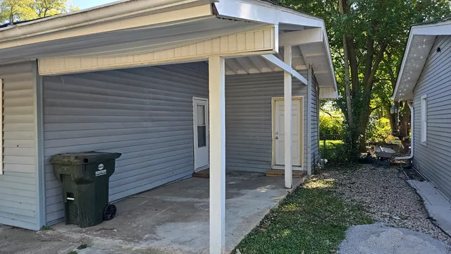 a view of a back yard of the house