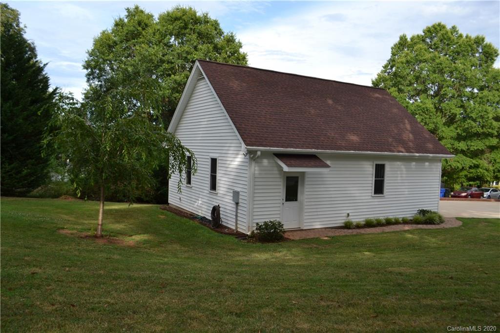 222 Maple Street Rutherfordton, NC 28139 - Photo 12 of 48 a front view of house with a garden