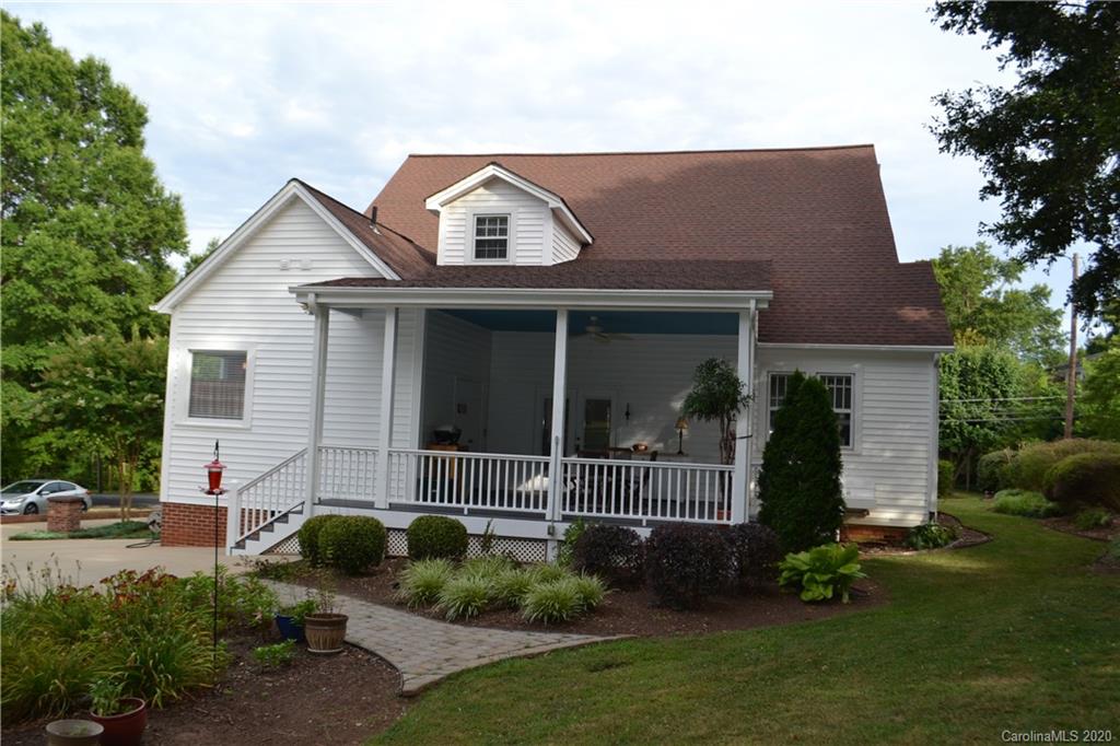 222 Maple Street Rutherfordton, NC 28139 - Photo 14 of 48 a front view of a house with a garden