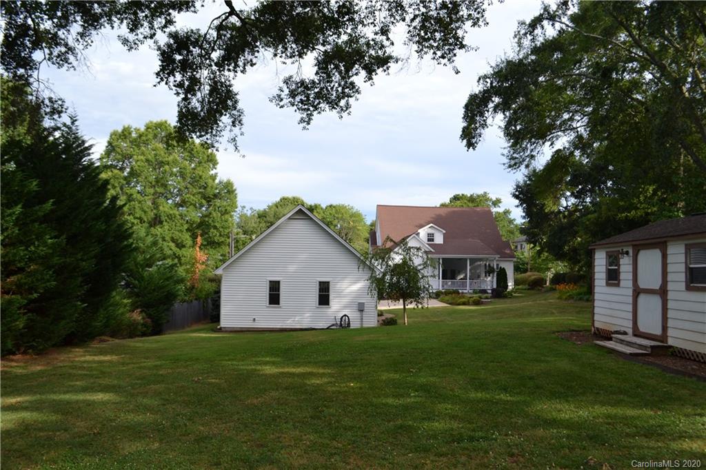 222 Maple Street Rutherfordton, NC 28139 - Photo 18 of 48 a front view of a house with a garden