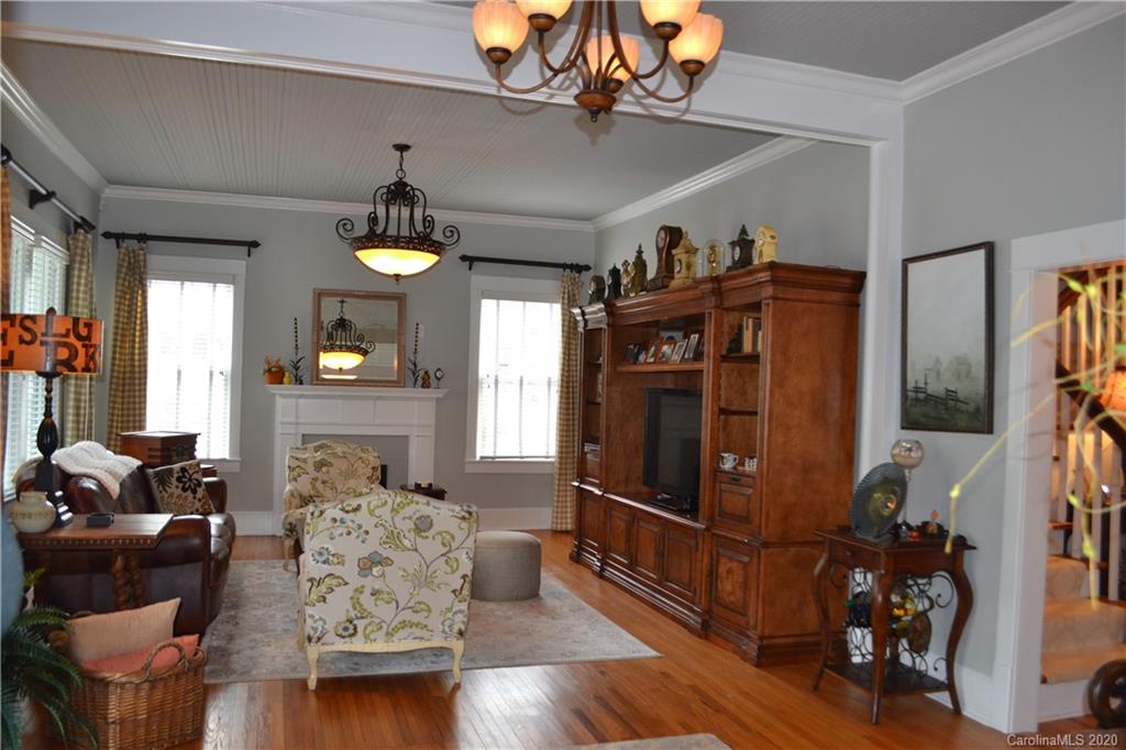 222 Maple Street Rutherfordton, NC 28139 - Photo 21 of 48 a living room with furniture and a chandelier