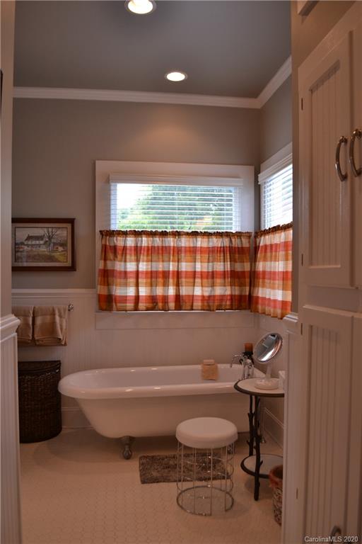 222 Maple Street Rutherfordton, NC 28139 - Photo 28 of 48 a bathroom with a sink a toilet and shower