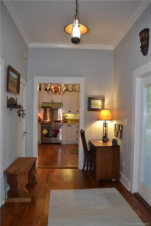 222 Maple Street Rutherfordton, NC 28139 - Photo 34 of 48 a living room with furniture and a chandelier