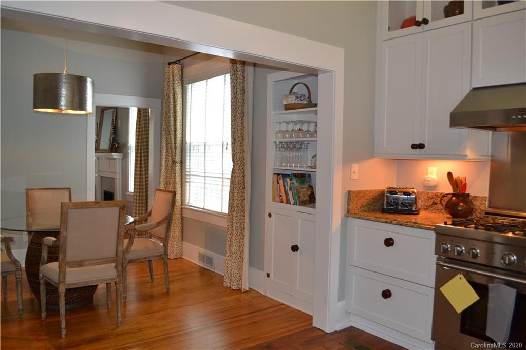 222 Maple Street Rutherfordton, NC 28139 - Photo 38 of 48 a dining room with furniture and wooden floor