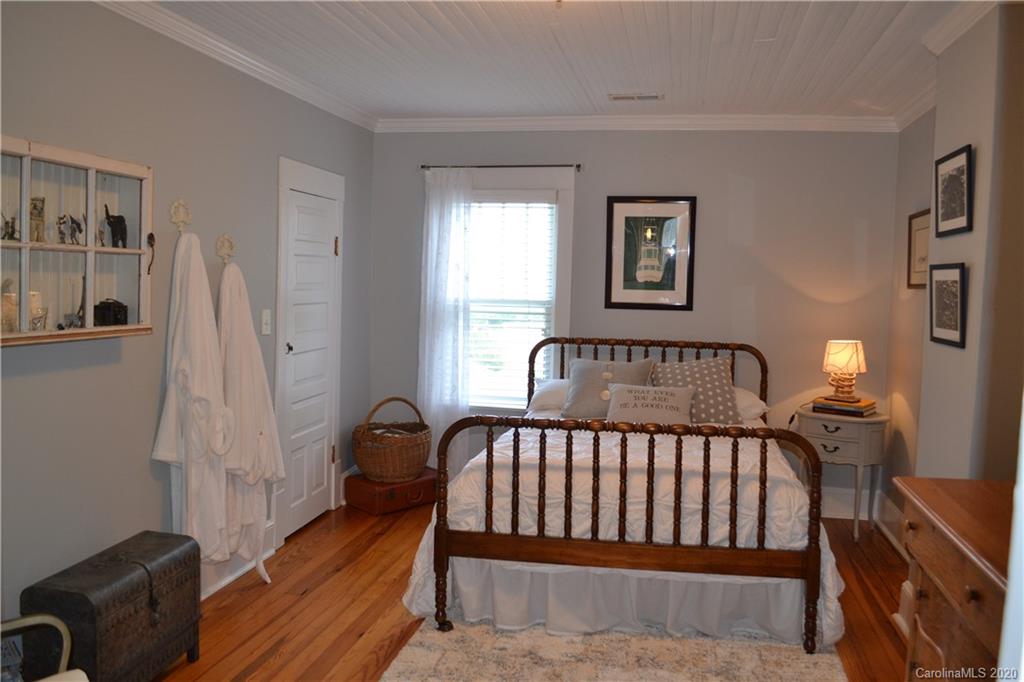 222 Maple Street Rutherfordton, NC 28139 - Photo 42 of 48 a bedroom with a bed and a window