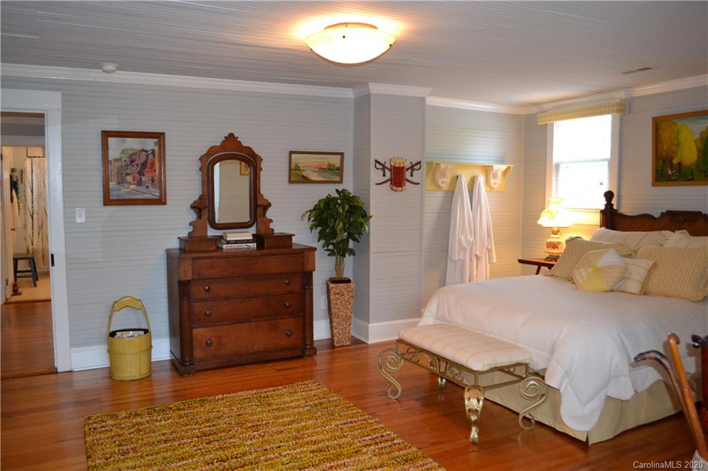 222 Maple Street Rutherfordton, NC 28139 - Photo 44 of 48 a bedroom with a bed and a dresser