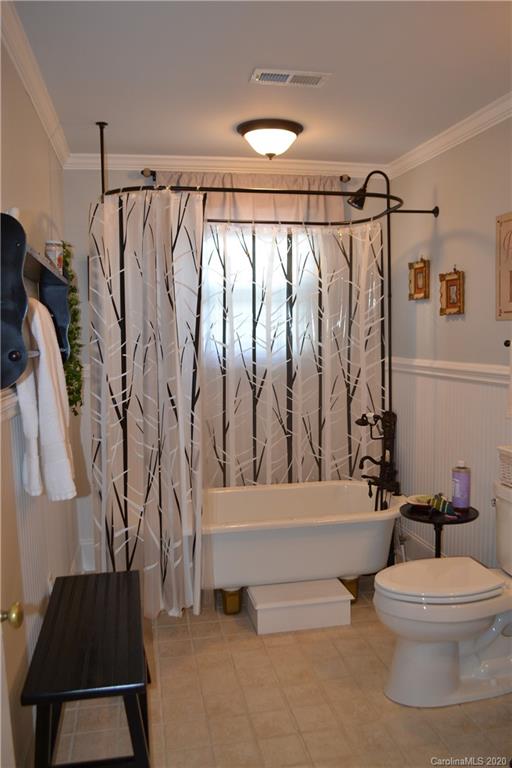 222 Maple Street Rutherfordton, NC 28139 - Photo 48 of 48 a bathroom with a bathtub and shower