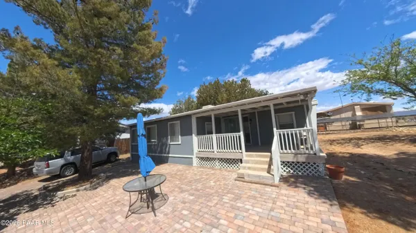 a house with yard in front of it