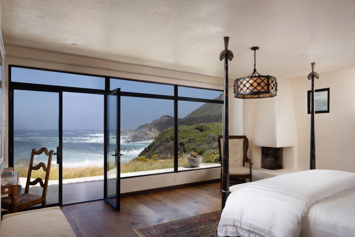 36654 Highway 1 Carmel, CA 93923 - Photo 14 of 23 a bedroom with a bed and a window